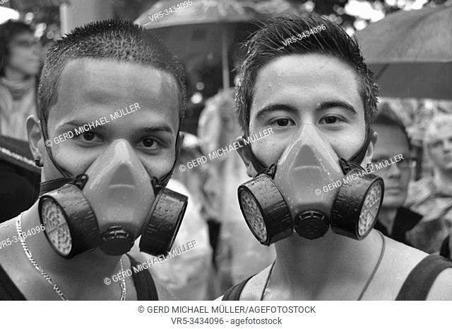 Switzerland: Two Ravers with gasmasks at the Streetparade in Zürich