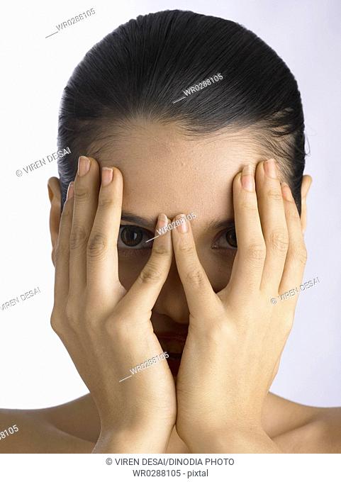 South Asian Indian woman hiding face with her hand MR 702