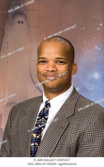 Astronaut Robert L. Curbeam, STS-116 mission specialist, poses for a portrait following a pre-flight press conference at Johnson Space Center