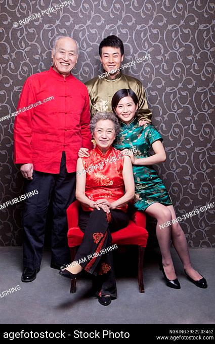 Family Portrait In Chinese Traditional Clothing
