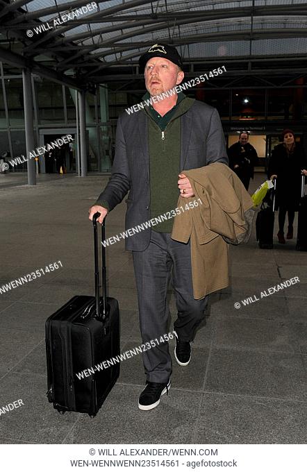 Boris Becker looks rather tired and puffy faced, as he limps through Heathrow Airport. It was unclear why he was limping