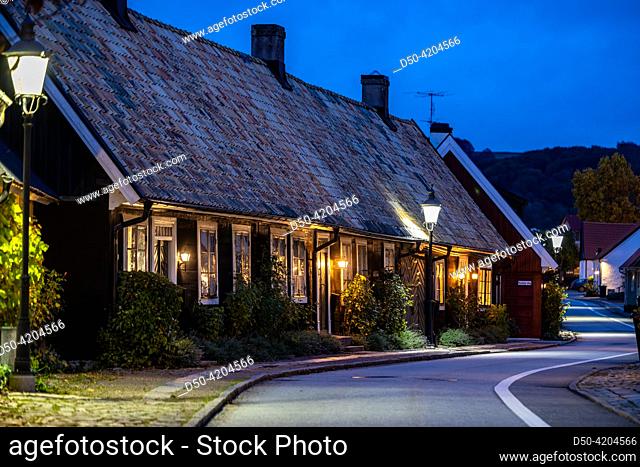 Bastad, Sweden Houses at night on the landmark and picturesque Agardhsgatan with street lamps