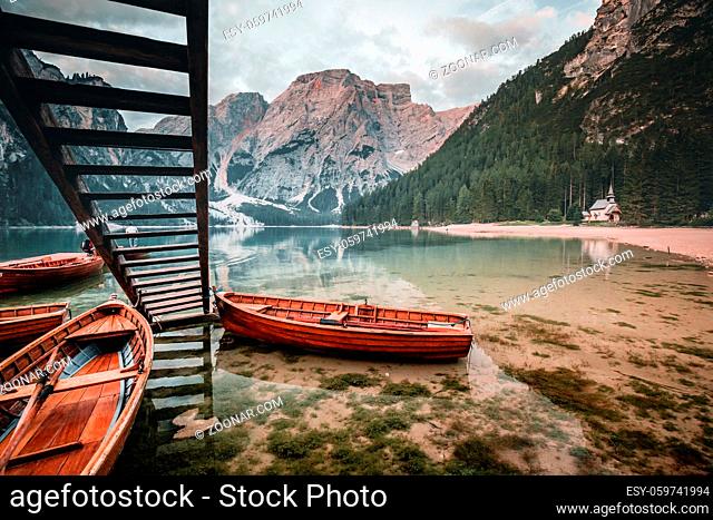 Lake Braies also known as Pragser Wildsee or Lago di Braies in Dolomites Mountains, Sudtirol, Italy. Romantic place with typical wooden boats on the alpine lake