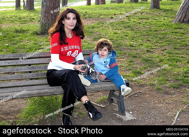 Italian showgirl Carmen Di Pietro with her son Alessandro Iannoni of 3 years. Rome (Italy), October 15th, 2003