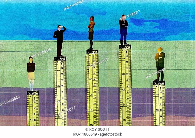 Rulers measuring height in corporate hierarchy