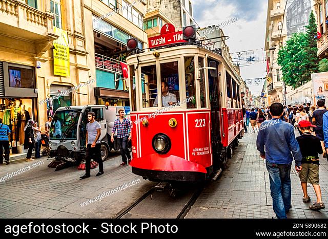 ISTANBUL, TURKEY - MAY 14 : Taksim Istiklal Street at eventide on May 14, 2013 in Istanbul, Turkey. Taksim Istiklal Street is a popular destination in Istanbul