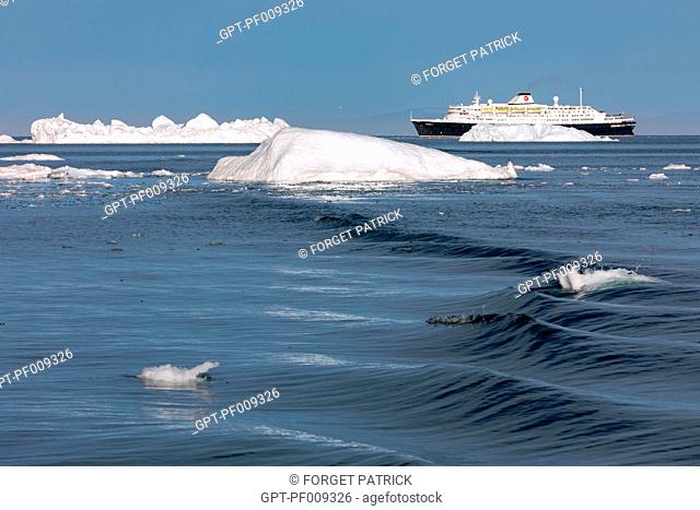 ASTORIA CRUISE BOAT IN THE MIDDLE OF THE ICEBERGS, GREENLAND, DENMARK