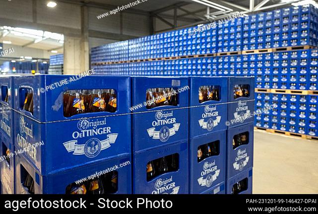 01 December 2023, Bavaria, Oettingen: Beverage crates are stored at the Oettinger brewery. Due to the difficult situation on the German beer market