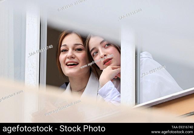 RUSSIA, GROZNY - MAY 23, 2023: Girls prepare for a traditional Last Bell ceremony to celebrate the end of young people's final year at secondary school No 18