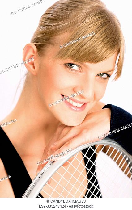 Tennis player woman young smiling leaning racket