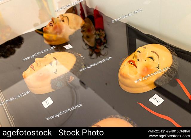 21 January 2022, Baden-Wuerttemberg, Waldkirch: So-called Glattlarven lie in a display case in the Elztal Museum. The main figure of the Villingen carnival is...