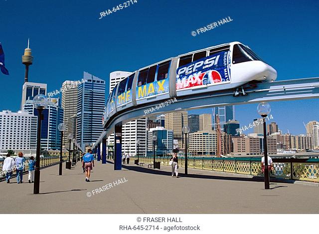 The Monorail at Darling Harbour with the city skyline beyond, Sydney, NSW, Australia