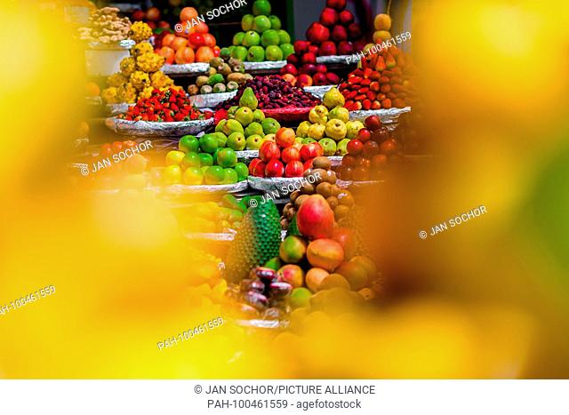 Piles of fruits (apples, pears, kiwis, strawberries, mangos etc.) are seen arranged at the fruit market of Paloquemao in Bogota, Colombia, 25 November 2017