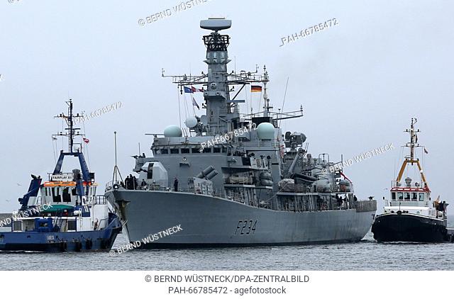The British frigate 'HMS Iron Duke' (F234, L) of the NATO naval force 'Standing NATO Maritime Group 1' (SNMG 1) arrives in Warnemuende, Germany, 18 March 2016