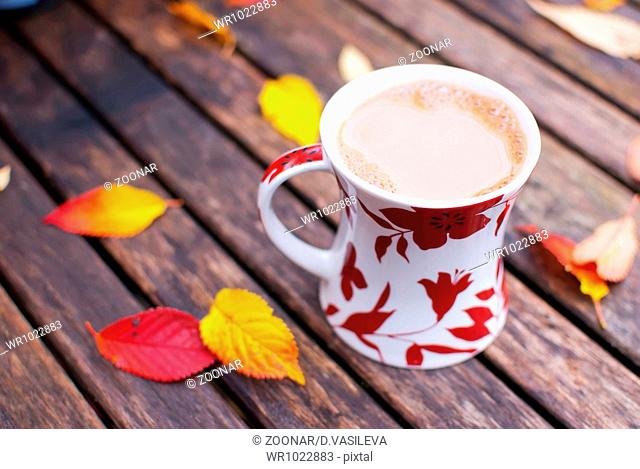 coffee with autumn leaves