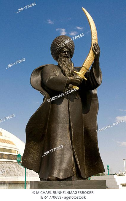 Statue with a sword in front of the Monument to the Independence of Turkmenistan, Ashgabat, Turkmenistan, Central Asia
