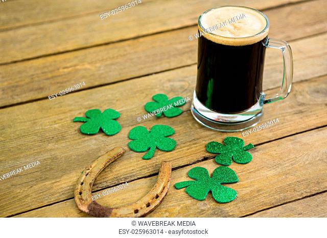 St Patricks Day green beer with shamrock and horseshoe
