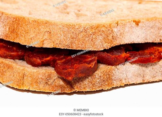 chorizo and traditional bread slices isolated on a white background