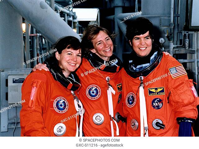 03/14/1997 --- STS-83 Alternate Mission Specialist Catherine Cady Coleman, Pilot Susan L. Still and Payload Commander Janice Voss mug for the camera at the...