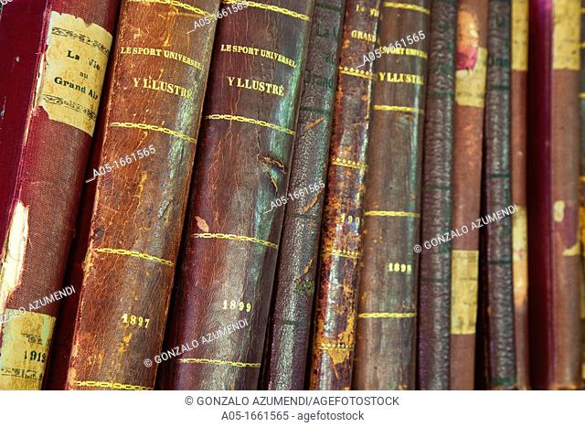 Old books on bookshelf. Le Sport Universel Encyclopedia.  The Royal Golf Club of San Sebastian. Fuenterrabia. Hondarribia. Guipuzcoa. Gipuzkoa