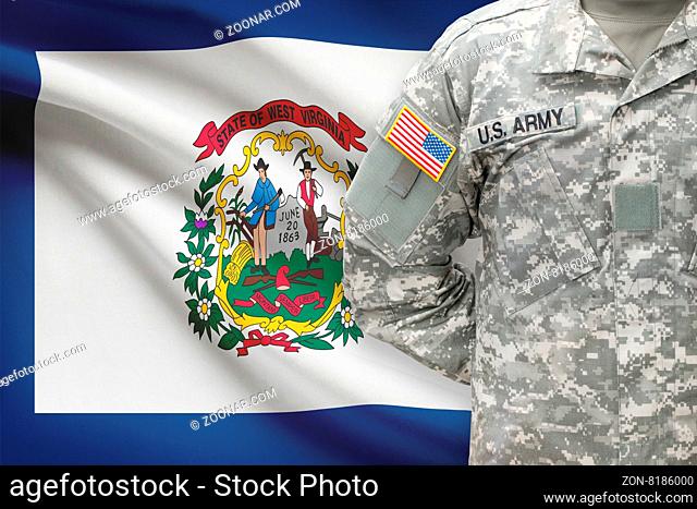 American soldier with US state flag on background - West Virginia