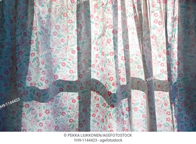 Curtain with flower pattern