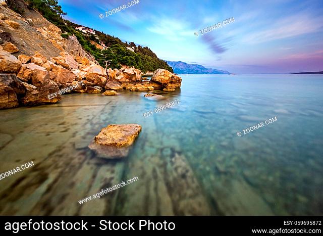 Rocky Beach and Transparent Adriatic Sea near Omis in the Evening, Dalmatia, Croatia