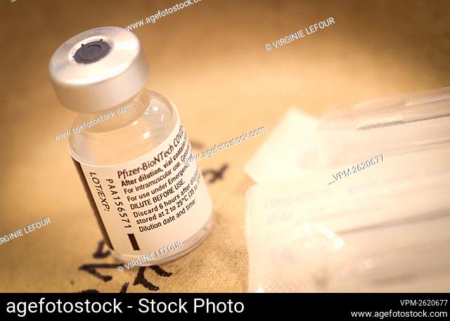 Illustration picture shows preparation of a vaccine shot, during the vaccination of the residents of the Quietude elderly home in Montigny-le-Tilleul