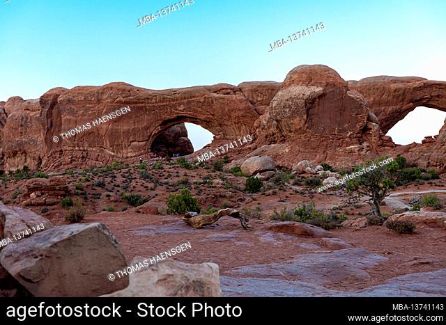 Turret Arch - a sandstone fin featuring large & small openings & a taller, turret-like rock pillar to the side. Arches National Park, near Moab in Utah, USA
