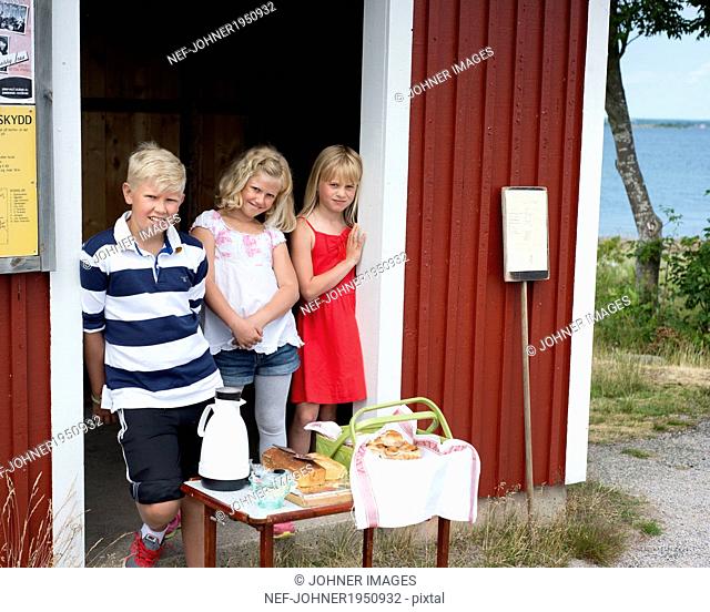 Children with food on table, Karlskrona, Blekinge, Sweden