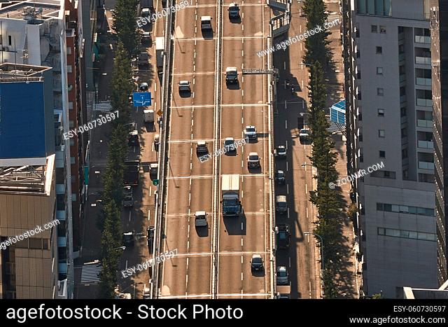 Cars driving on an urban expressway in Japan