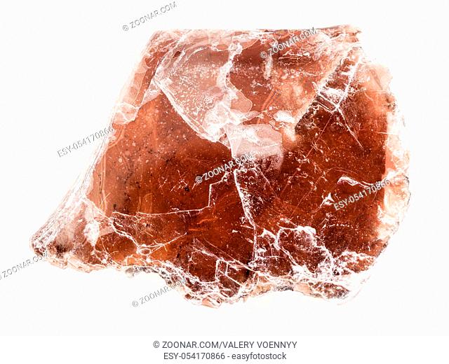 macro shooting of natural mineral rock specimen - raw brown mica lamina on white marble background