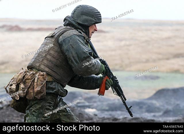 RUSSIA, DONETSK PEOPLE'S REPUBLIC - DECEMBER 11, 2023: A serviceman takes part in team training for combat units of the 9th Motor Rifle Brigade, 1st Army Corps