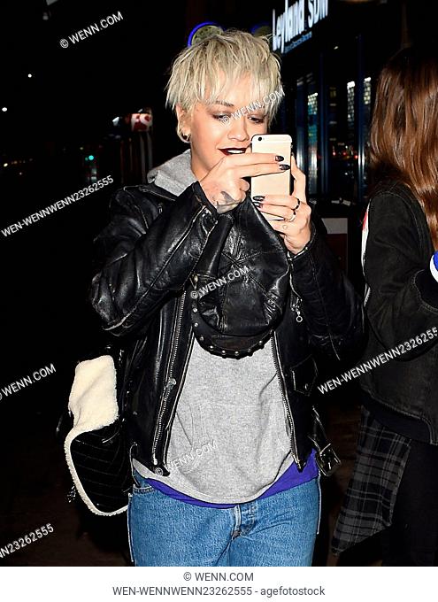 Rita Ora seen showcasing her new hair cut and style ahead of the X Factor final on Sunday. The X Factor judge, singer was seen stepping out at Pizza Express in...