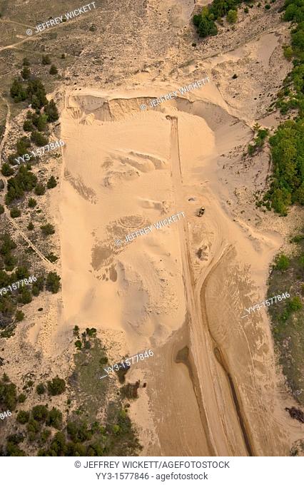 Aerial view of a sand mining operation near Lake Michigan and boarders on the Ludington Dunes State Park in Michigan, USA