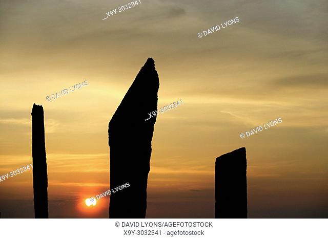 Standing Stones of Stenness, Orkney. 5m high prehistoric megaliths stone circle henge monument. originally of up to 12 stones over 5000 years. Sunset