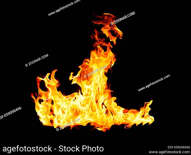 Fire flames - isolated on black background. Real photo