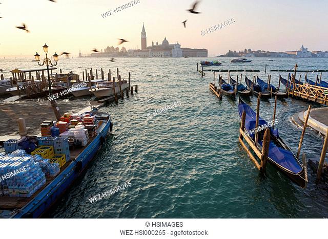 Italy, Venice, Morning deliveries on Canal Grande at St Mark's Square