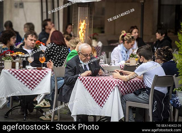 Historic center of Rome. Tourists flock to bars and restaurants during happy hour. Tourism activity is recovering after the loosening of prevention regulations...