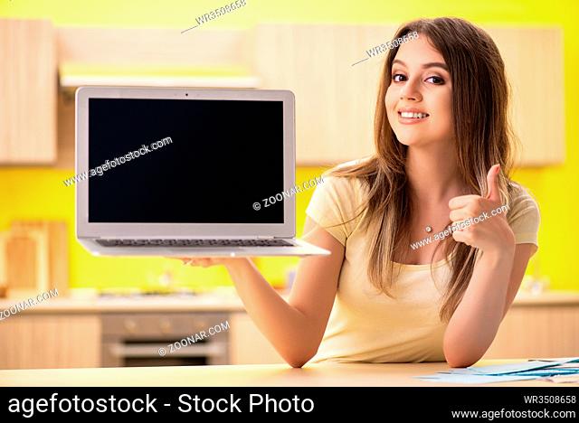 Woman blogger presenting on her laptop