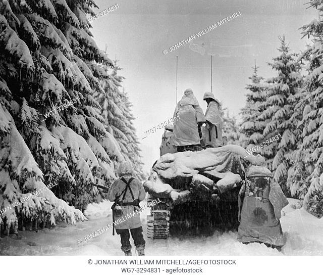 BELGIUM Herresbach -- Jan 1945 -- US 1st Army tanks and infantrymen of the 82nd US Airborne Division, Company G, 740th Tank Battalion, 504th Regiment