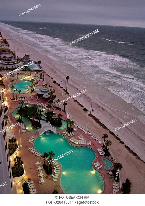 Daytona Beach, FL, Florida, Atlantic Ocean, aerial, swimming pools, pool lights, Fairfield Resorts at Ocean Walk, Ocean Walk Resorts, beaches, evening
