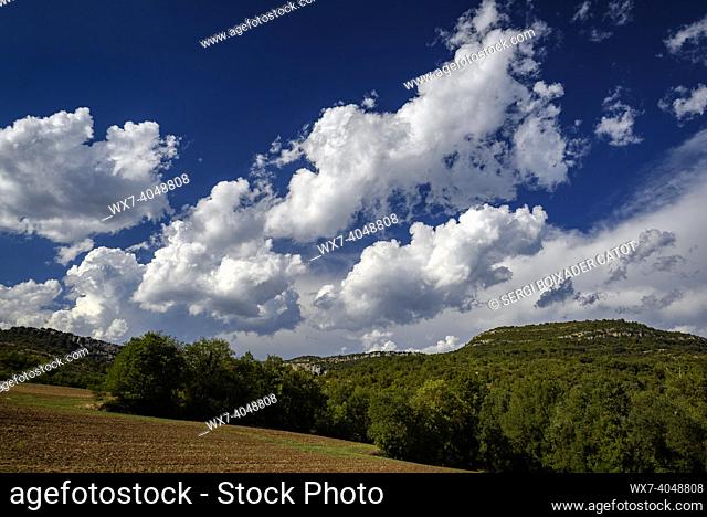 Afternoon and storm clouds, seen from the Ariet valley, in the Sant Mamet mountain, in Montsec (La Noguera, Lleida, Catalonia, Spain)