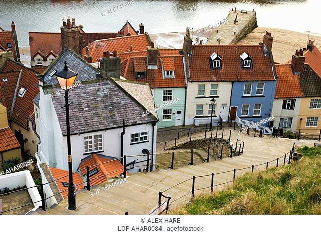 England, North Yorkshire, Whitby, A traditional street light illuminates the 199 steps leading down towards the old town of Whitby