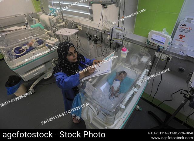 16 November 2023, Palestinian Territories, Khan Yunis: Newborn infants receive care inside incubators at Nasser Hospital's nursery department