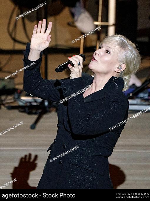 02 January 2022, Hamburg: Ina Müller, singer and music cabaret artist, is on stage at the Elbphilharmonie for her ""New Year's Concert""