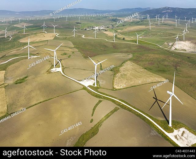 Windmills on a wind farm near Zahara de los Atunes. Aerial view. Drone shot. Cádiz province, Andalusia, Spain