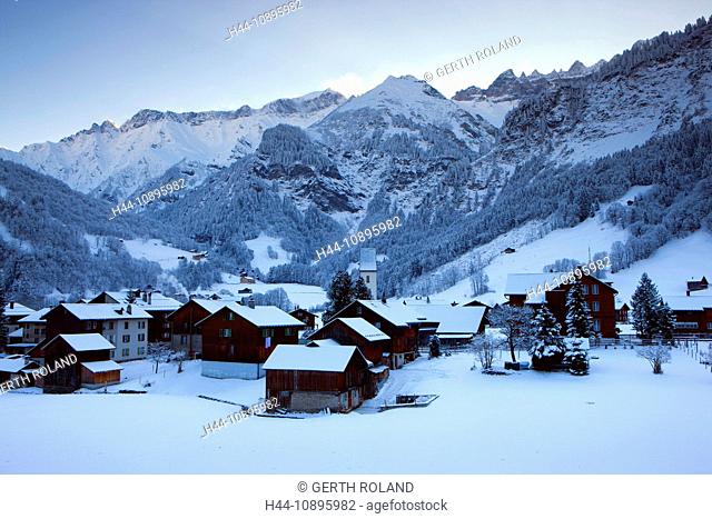 Elm, Switzerland, Europe, canton Glarus, village, houses, homes, church, winter, snow, mountains