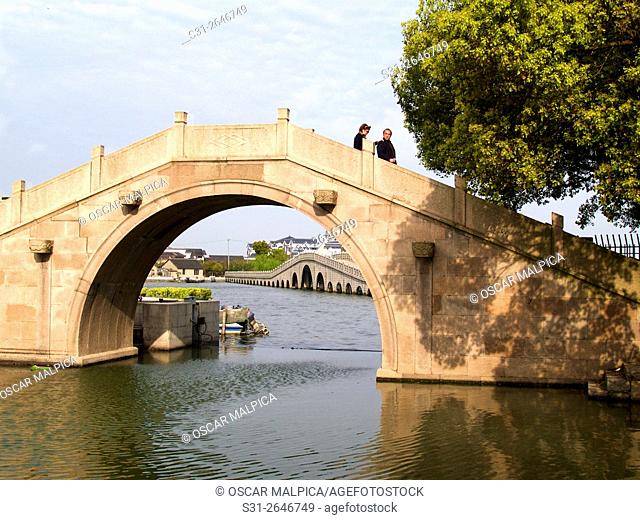 ancient chinese bridge in zhouzhuang water town china