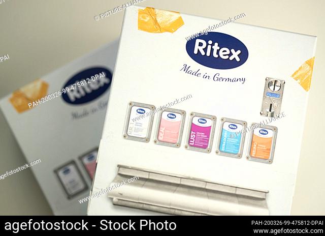 25 March 2020, North Rhine-Westphalia, Bielefeld: One package for condoms from the German manufacturer Ritex is on top of another